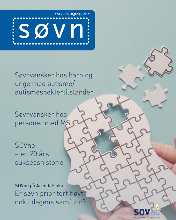 En hånd som holder et kort