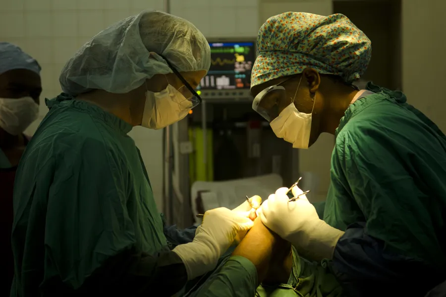 A group of surgeons performing surgery