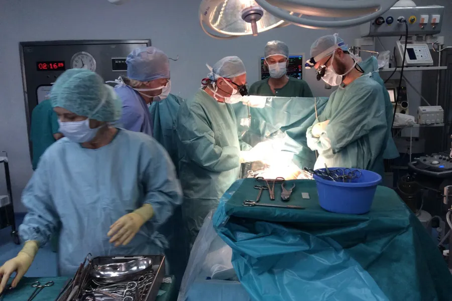 A group of surgeons performing surgery