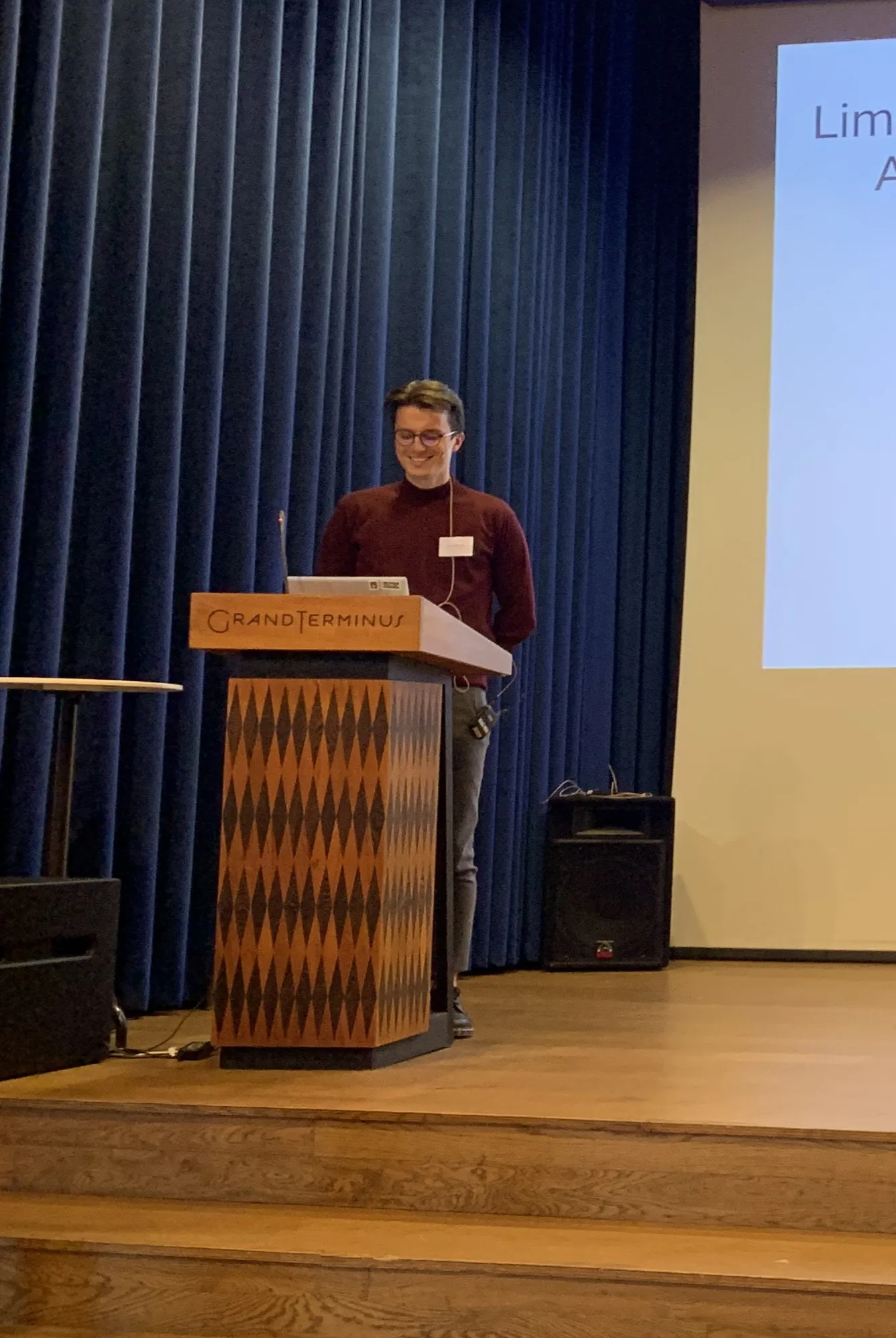 A person standing at a podium