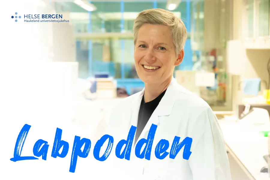 Ei kvinne i kvit frakk