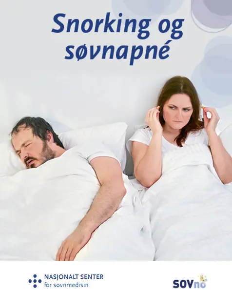 En mann og kvinne som ligger i sengen